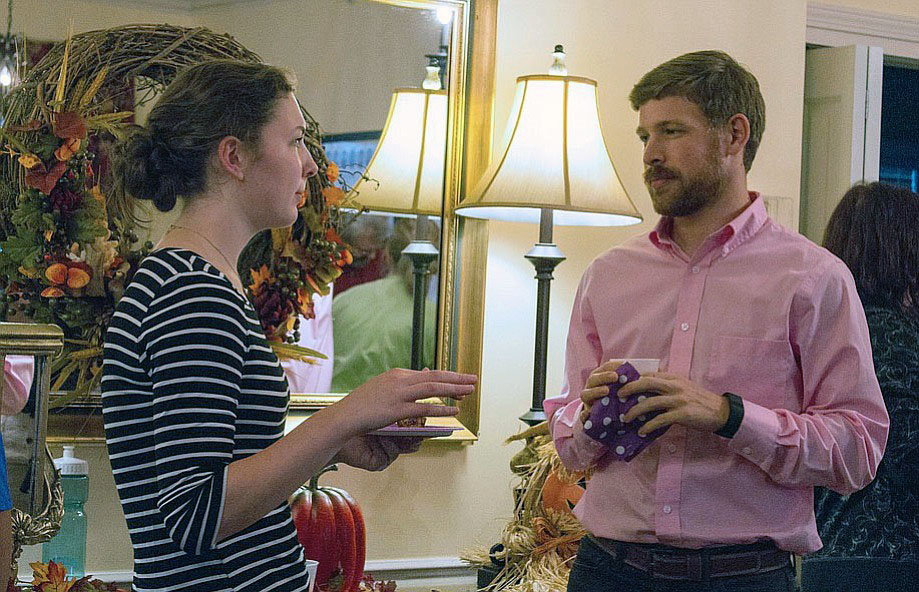 Sophomore Emily Riggs speaks with Assistant Director of Student Life Josh Doak at Alpha Chi Omega sororitys Muffins and Mentors event on Oct. 7. Doak is the new advisor for fraternity and sorority life. Image by Lexi Loya.