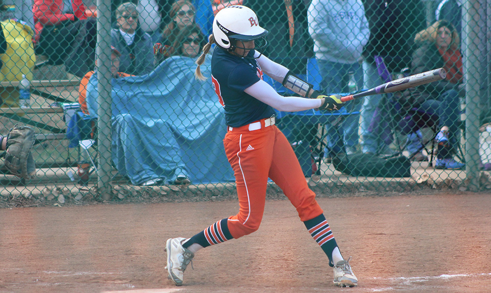 Junior Savannah Bellem swings at a pitch against Concordia on Sunday, Feb. 26. Bellem hit her first home run of the season against Concordia. Image by Justin Toumberlin.