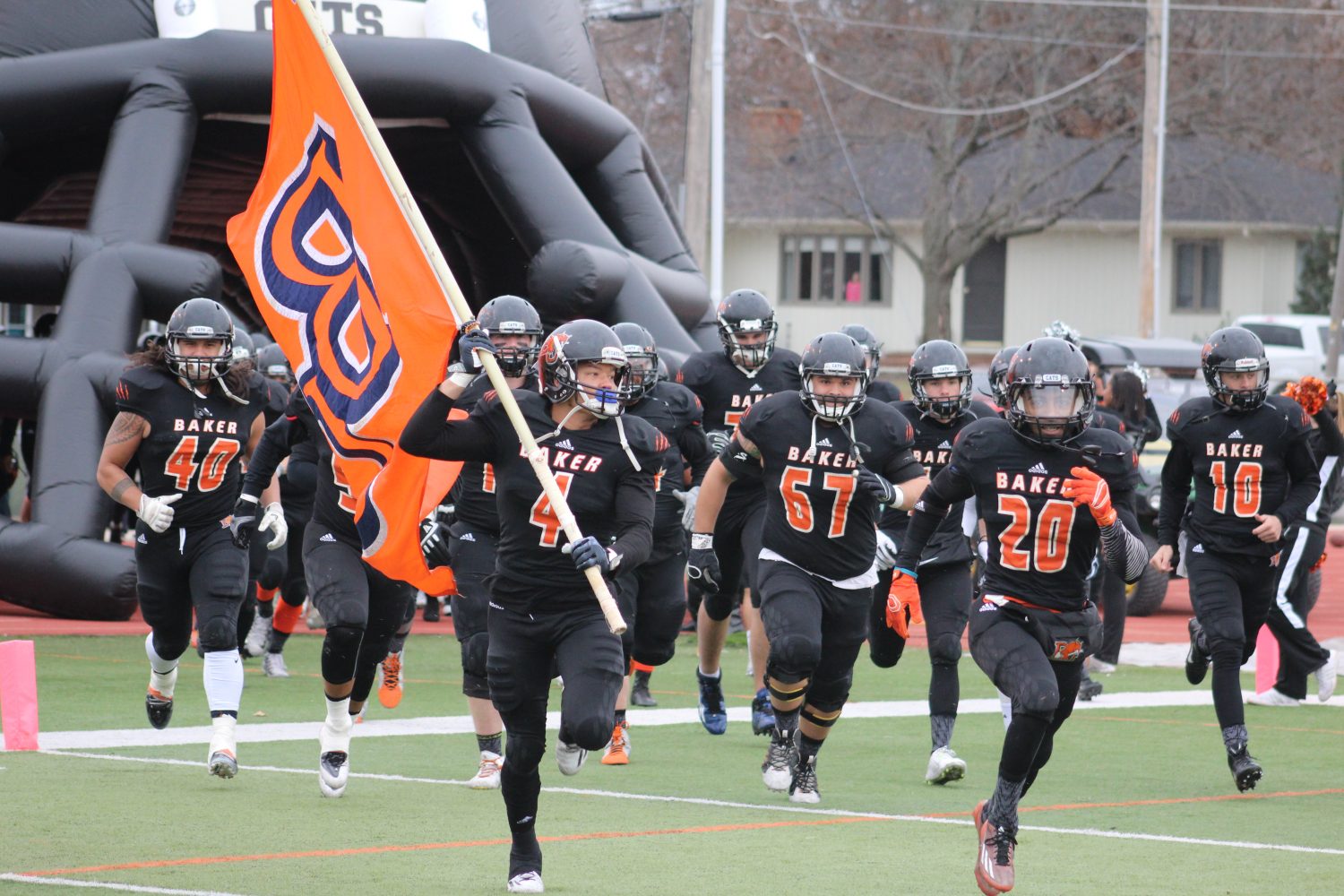 Baker takes the field before its first NAIA-FCS semifinals since 1993. The Wildcats beat Eastern Oregon 45-41 and advanced to their first title game since 1986. Image by Shelby Stephens.