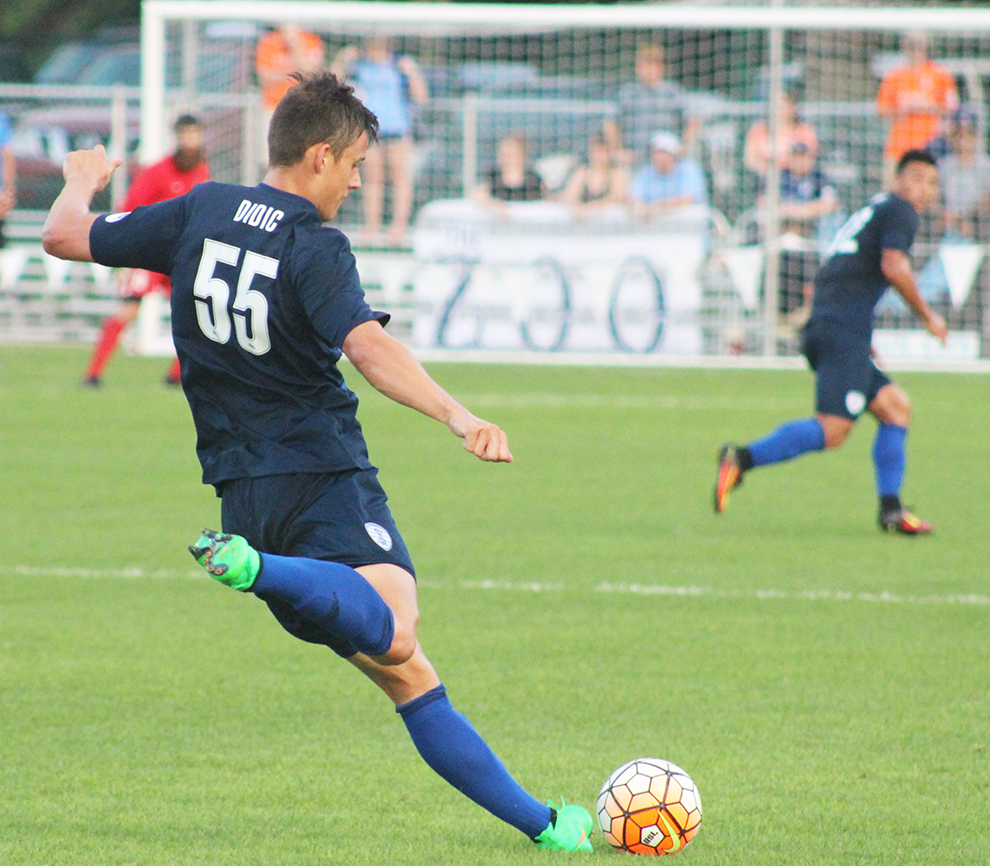 Amer Didic passes the ball to his teammate in the first half of the game against San Antonio FC on July 30. Image by Shelby Stephens.