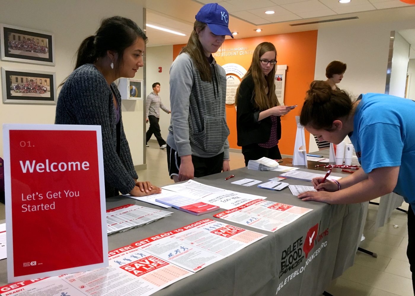 Graduate Assistant Gabby Garrison and freshman Emily Riggs help freshman Kendall Stelting sign up to be a bone marrow donor on March 8 in the Long Student Center. The chance of being a match is rare, but could help save the life of someone battling blood cancer.