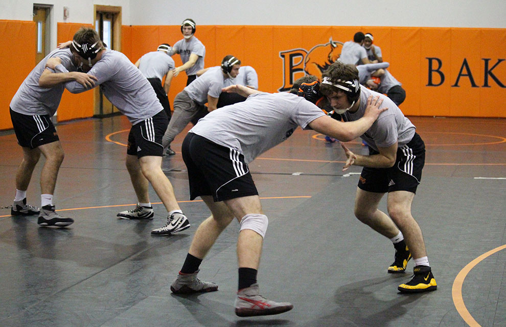 Wildcat wrestlers practice for their first event of the season, the Dan Harris Open, on Nov. 6 in the Collins Center. Image by Jenna Black.