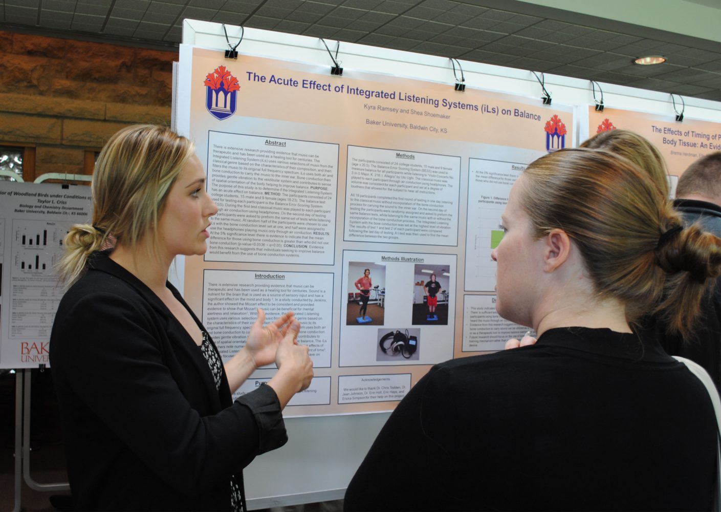 Senior exercise science major Kyra Ramsey makes a presentation to Associate Professor of Psychology Sara Crump on her partnered research on integrated listening programs and the effects they have on balance for individuals. The presentation was part of the Dialogos Scholars Symposium April 22, 2015. Image by Cassie Long.