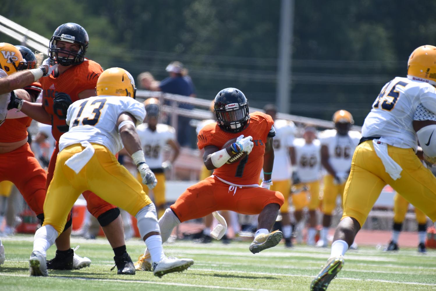 Football vs. William Penn – The Baker Orange