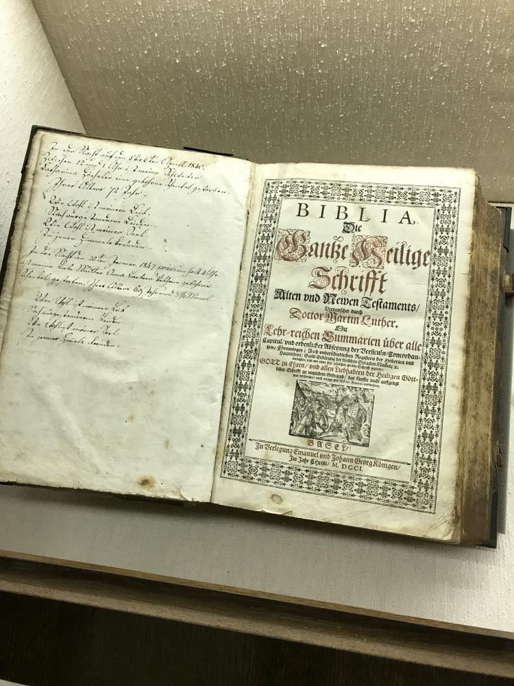 One of John Luthers translations of the Bible with a German familys writing on the side. This is a newer Bible, written in the 1700s.