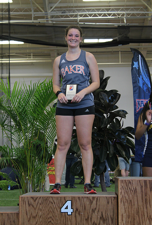 McCollum stands on the fourth place podium to receive her All-American accolade. Fourth place is the highest McCollum has attained in her career.    