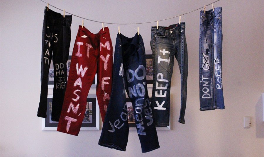 BRäV hangs jeans with words to advocate and spread awareness about sexual assault on campus. The group members painted sayings such as It wasnt my fault on the pants to encourage campus to stop victim blaming.  