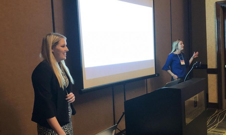 Seniors Madison Lutzs and Hannah Tolliver share their presentation at the Womens Leadership Conference in Nebraska. 
