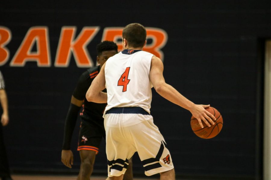 Colby Bullock handles the ball during Wednesdays match up with Missouri Valley. The Tigers defeat the Wildcats 59-72.