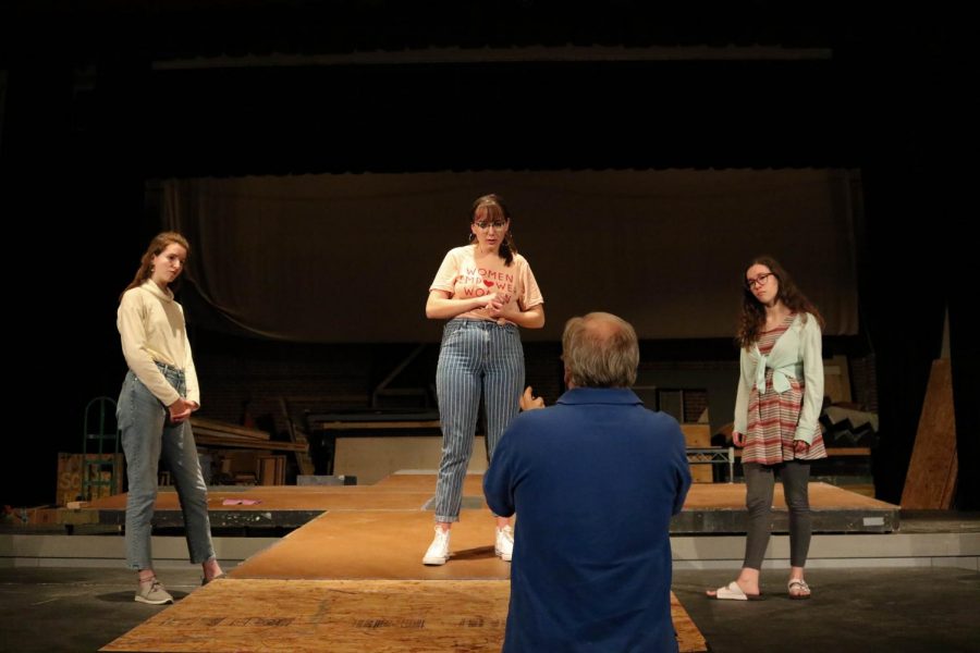 Left to Right: Sophomores Isabel Ashley and Emory Rodda and senior Alyssa Glover absorb notes from Associate Professor of Theatre Tom Heiman. The play 