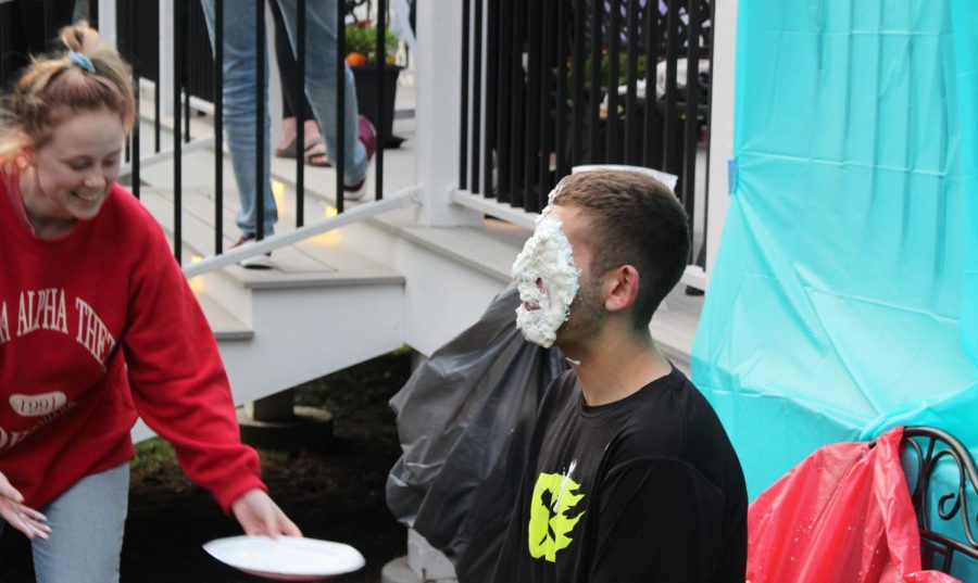 Zeta Chi partnered with Alpha Chi Omega for their Chi Pie philanthropy event. Junior Dylan Kort took a plate of whipped cream to the face from Sophomore Abby Richard.
