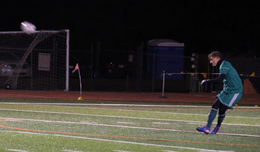 Junior Lorenzo Giaretti kicking the ball towards Missouri Valley Colleges goal. 