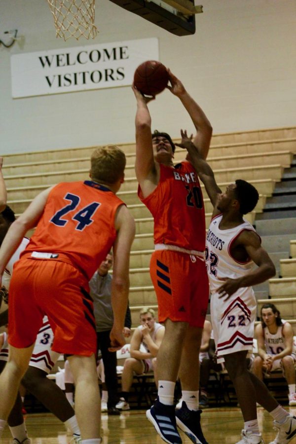 Freshman Aaron Nancarrow going up for a shot against Baptist Bible College. Nancarrow records seven points in the first three games of the season.