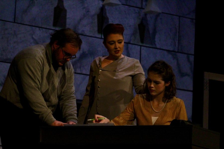 Sophomores Cade Cooper and Kenzie Kuhlmann and freshman Sami Aceto all fulfilling their roles in the play Hedda Gabler. They added their own modern kick to the play, adding a same-sex relationship. 