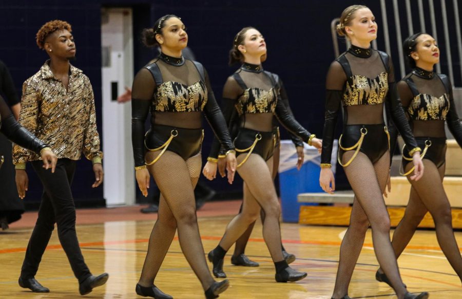 The Baker Dance Team marches out during the preliminary round at the 2020 Midwest Regional Qualifier on Feb. 28.