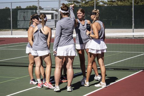 Womens tennis celebrates after their doubles win against Missouri Valley