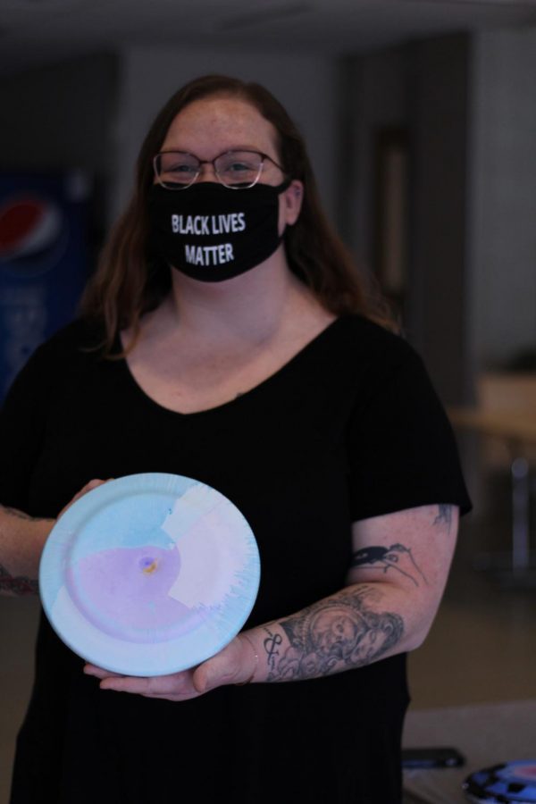 Student Activities Council Social and Cultural Issues Coordinator Jesse Gardner presents her own spun frisbee.