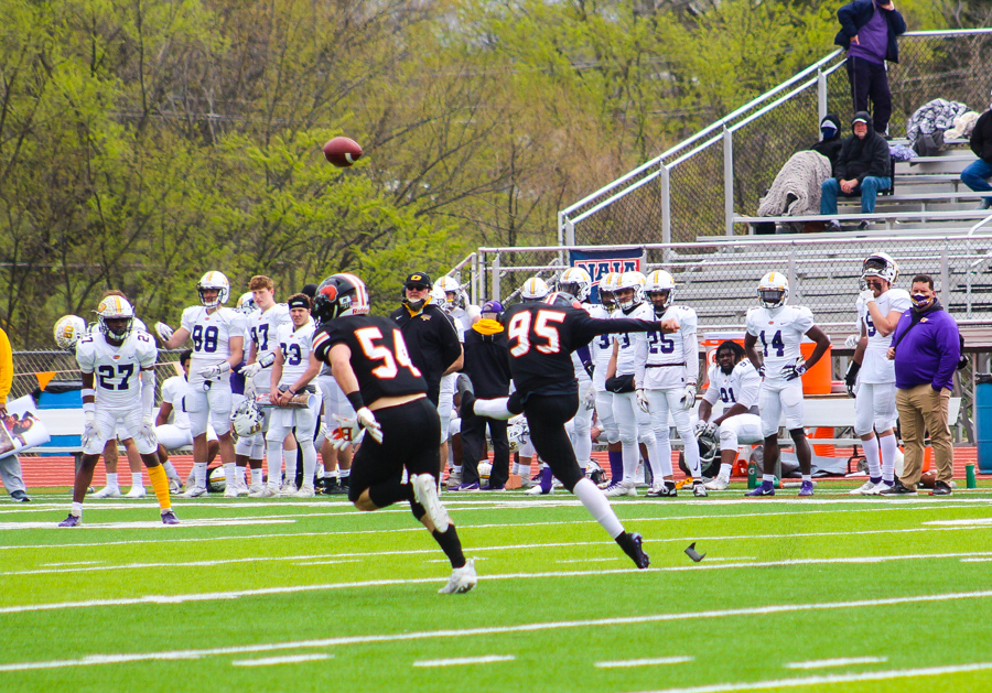 Freshman Kicker Devin Derousse attempts a field goal after a Baker touchdown.