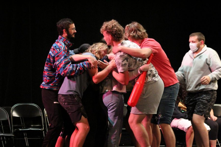 A group hug amongst the participants takes place during the hypnosis act.

