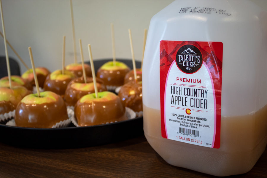 Apple cider was offered to go with the caramel apples. 