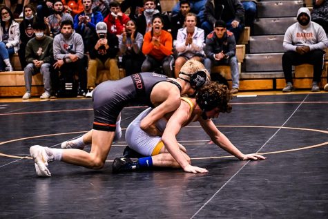 Freshman Tristan Stafford wrestles first at 125 and gets the first Baker win of the night.