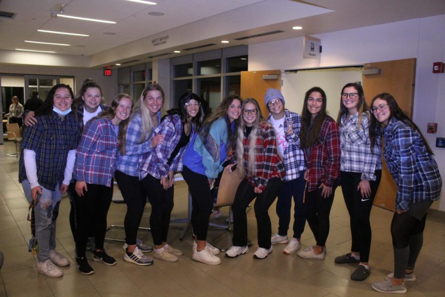Baker students use flannel as their family photo theme. This was the largest group to take photos at the event. 
