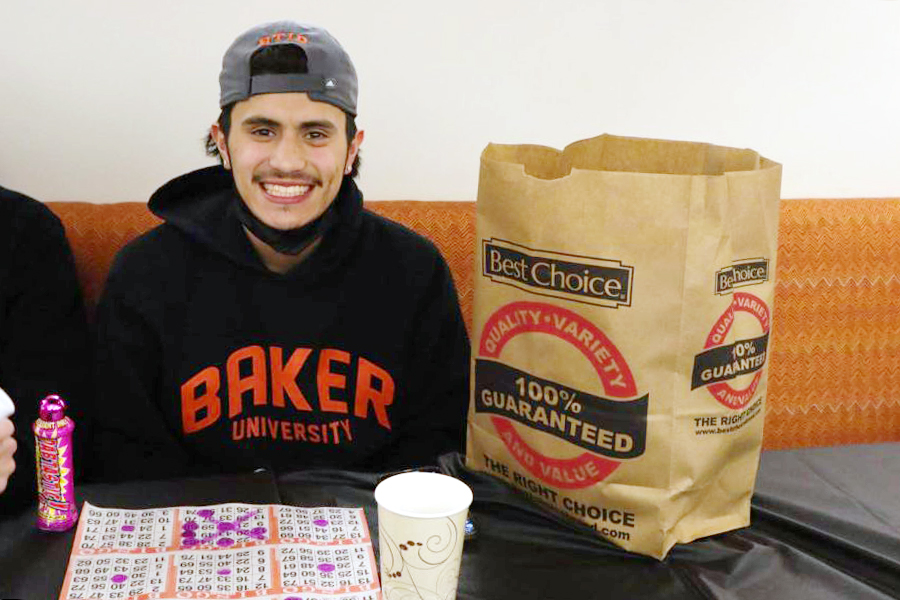 Freshman Jimmy Adame puts on a big smile after winning a bag full of snacks that included soda, candy, crackers and chips.