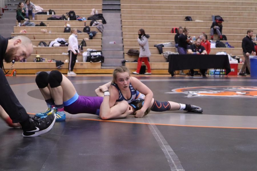 Sophomore Nicole Moore takes down her opponent from Waldorf University. Moore went on to win her remaining matches, ending the day as Conference Champion. 