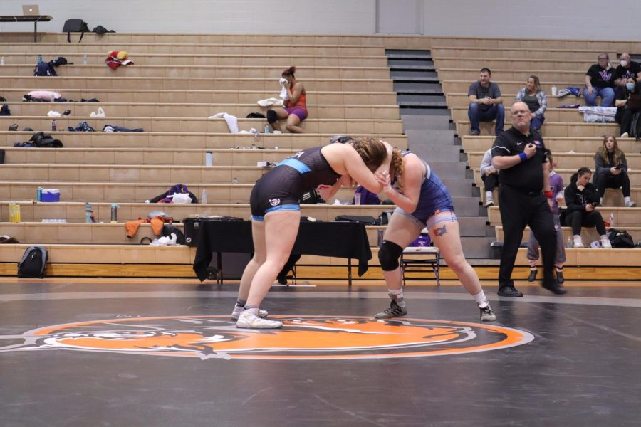 The womens wrestling team competes in a freestyle wrestling competition for conference. This is the most common style among collegiate sports.