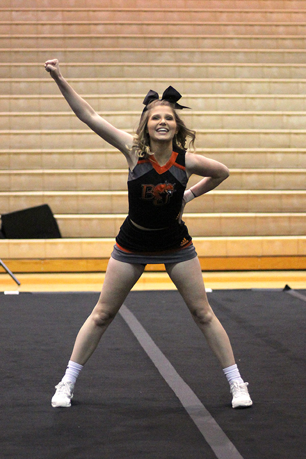 Freshman Jacilynn Brewer hits a pose. The team scored 64.13 for their routine, taking eighth place in the competition. 