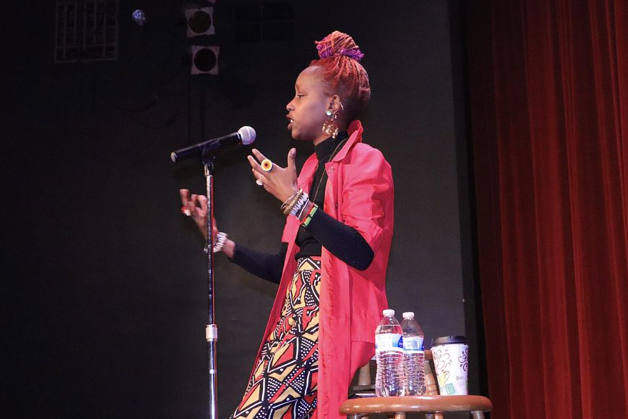 Katwiwa recites an original piece entitled Freedom Is... Throughout this poem, Katwiwa expresses that freedom has more than one meaning. Katwiwa has also presented her own Ted Talk and was the 2018 Women of the World Poetry Slam Champion.

