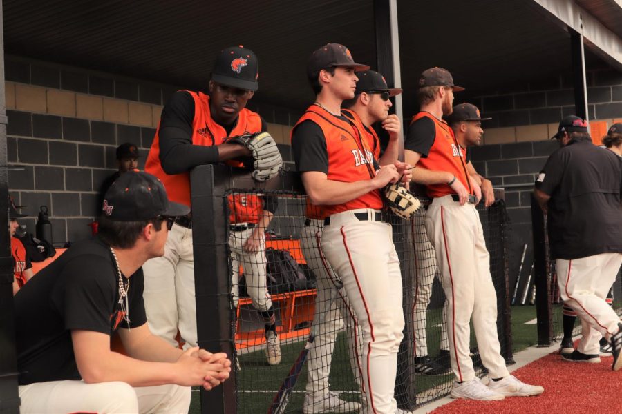 Players converse in the dugout. Baker will host 10 more games this season.