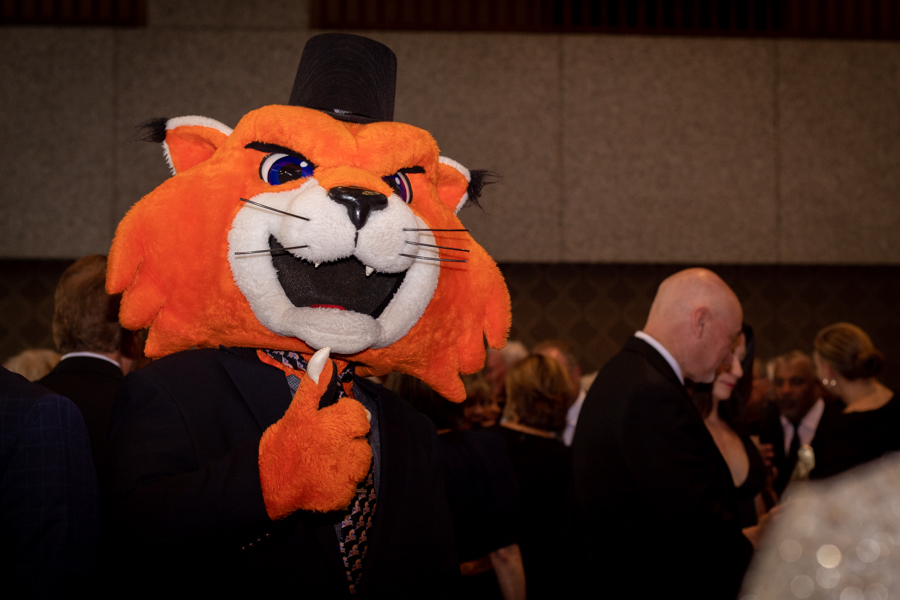 On Saturday May 7, Baker University hosts a gala to celebrate the success of the Forever Orange fundraising campaign. As guests arrived, they were greeted by Wowzer and given the option to get a photo in front of a decorative balloon backdrop.