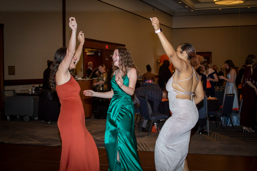 Senior Lexi Hastie (left), Junior Grace Duddy, and Senior Jaila Randle (right) take advantage of the dance floor to celebrate the campaign victory.
