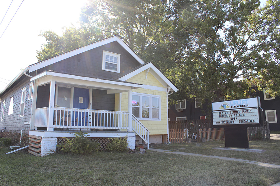 Outside of the shop with the new Uplift signage. 