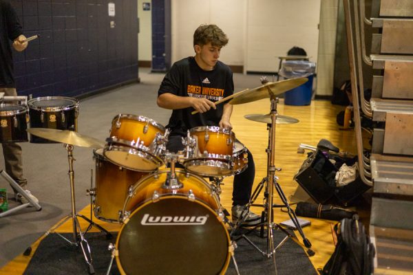 Noah Clark performs with the Pep Band on Feb. 26, at the quarterfinals of the Men's Basketball NAIA Heart of America tournament in Collins Center.