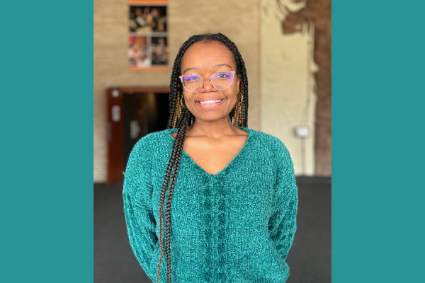 Junior theatre student Mya Dunn smiles in Rice Auditorium lobby, after she recalls the ceremony where she received the Irene Ryan Region 5 Scholarship.