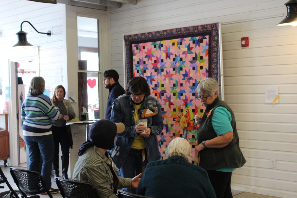 Community members stick around after the event to get to know each other.