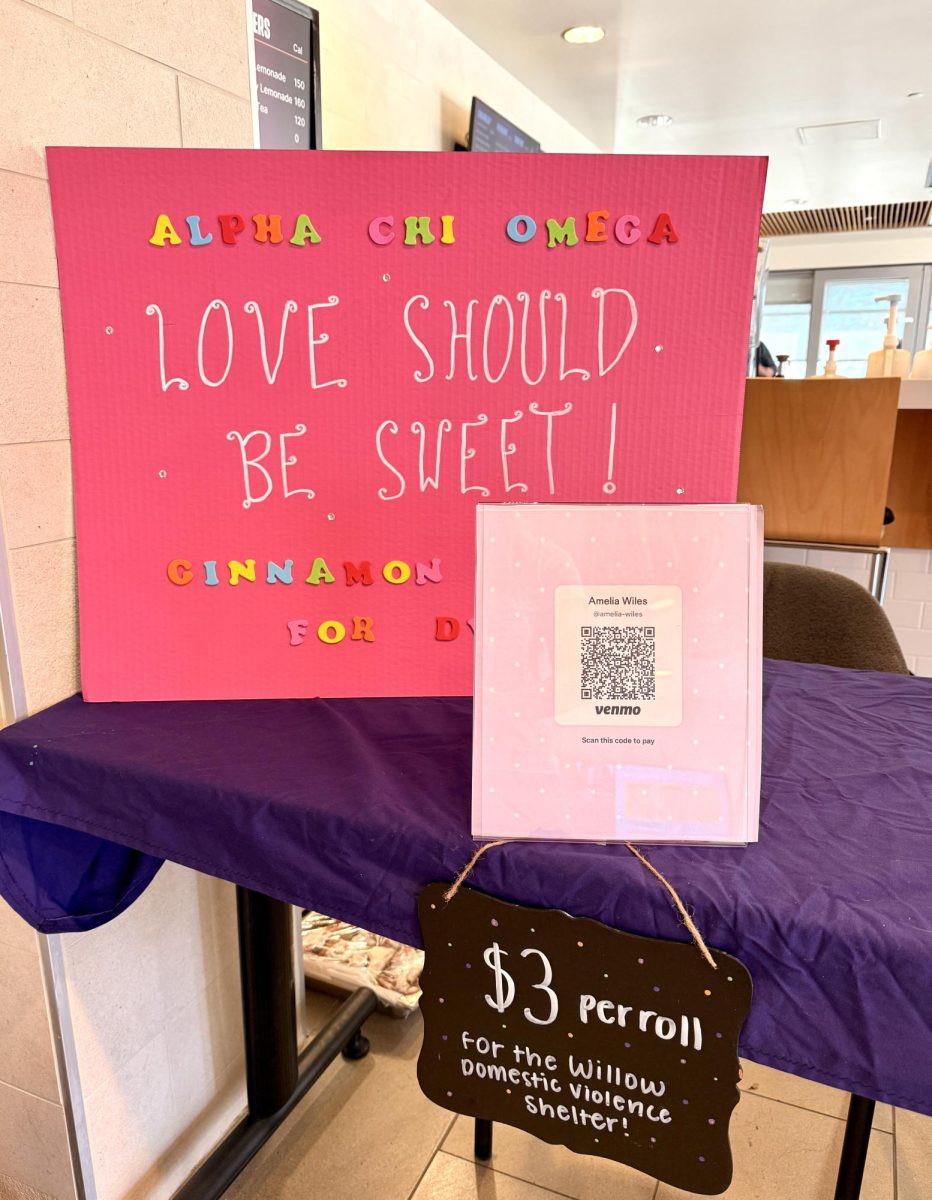 Baker University's Alpha Chi Omega chapter tables for Healthy Relationships Week.