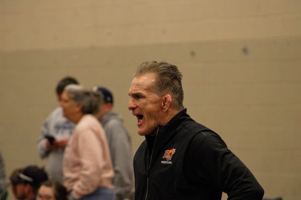 Coach Jimmy May coaches at the tournament named in his honor