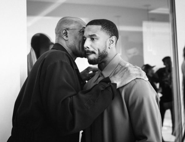 Delroy Lindo comforts Michael B. Jordan following incident on BAFTA's stage.