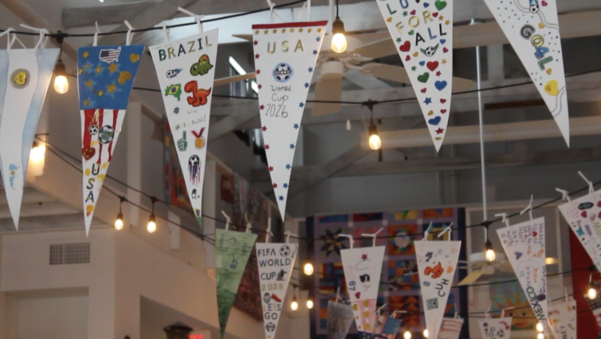 World Cup pennants hang in the Lumberyard. 